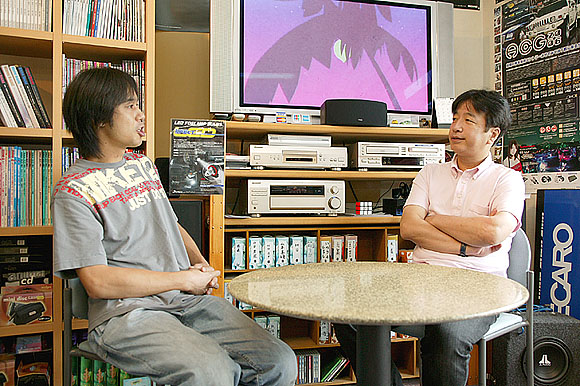 Car Audio Club代表・高橋さん（左）とレポーターの永松巌氏（右）