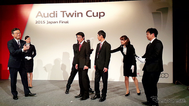 テクノロジー部門で優勝したAudi宇都宮チームとアウディジャパン代表取締役・齋藤徹氏（左）