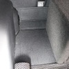 写真では見えないがラゲッジのフロア下にはサブウーファー用のパワーアンプであるキッカーKXA1200.1がインストールされている。
