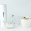 左より、「GINZA20周年ハンディステンレスボトルホワイト500ml」4,600円、「スターバックス カード GINZA20周年」1,000円以上の入金で発行可能（松屋銀座を除く）、「GINZA20周年マグ390ml」1,400円。「GINZA20周年グラスマグ400ml」1,500円